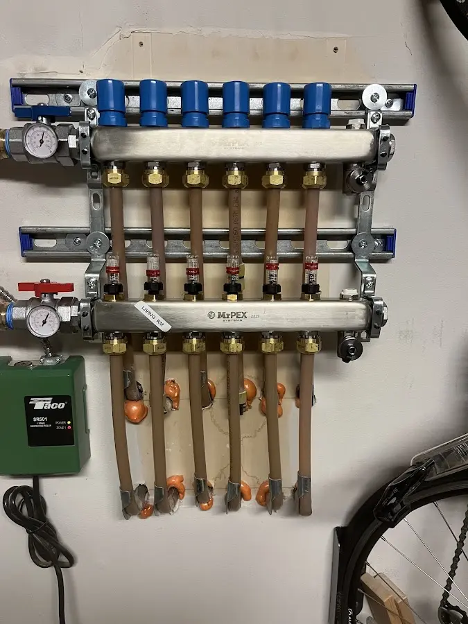 Plumber performing Water Heater Repair at a residential property in Maywood